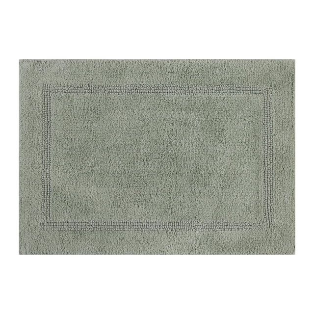 Better Homes & Gardens Cotton Reversible Bath Rug, Green River, 17" x 24", made of 100% cotton with a soft, absorbent texture and subtle rectangular border, machine washable and reversible, ideal for bathroom use with anti-skid pad recommended.