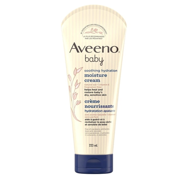 Aveeno Baby, Soothing Relief, Moisture Cream in a 223 mL beige tube with blue flip cap, containing natural colloidal oatmeal and vitamin E to soothe and moisturize dry, sensitive baby skin for 24 hours, fragrance-free and hypoallergenic for daily use.