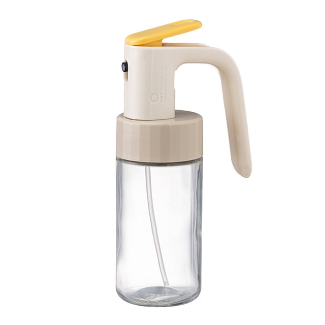 zanvin Oil Sprayers Kitchen Accessories, a press-type sprayable and inverted oil dispenser with a 250ml glass container and ergonomic handle. Features a beige lid and yellow lever for controlled spraying or pouring, suitable for olive oil, vinegar, and other liquids. Ideal for cooking, baking, BBQs, and kitchen organization.