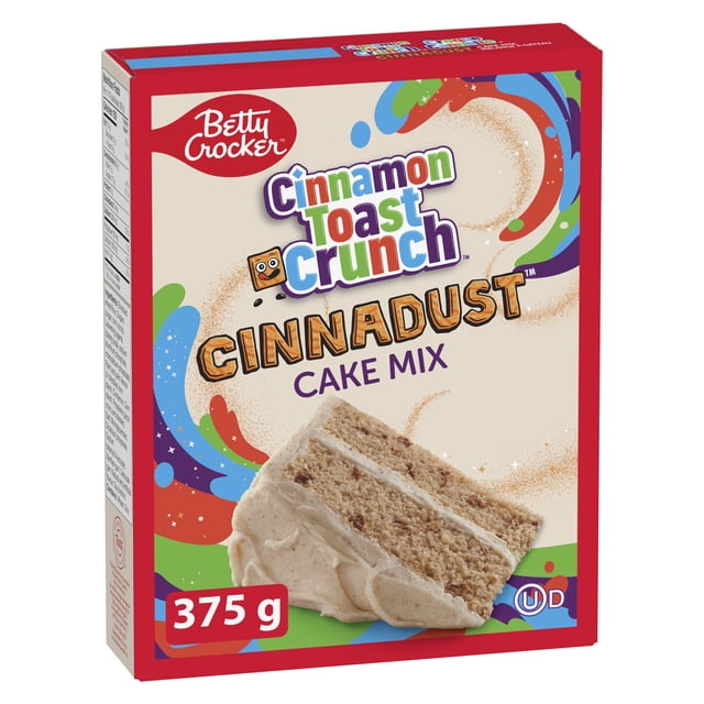 Betty Crocker Cinnamon Toast Crunch made with Cinnadust Cake Mix 375 g box showing colorful swirls and a cinnamon-flavored layered cake slice with creamy frosting, kosher dairy certified, suitable for baking fresh cinnamon treats at home.
