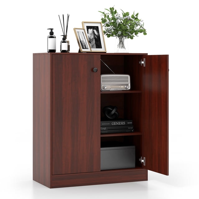 Costway Armoire de Rangement Autoportante à 2 Portes avec Étagère d'Entrée à 3 Niveaux Brun. une Armoire d'Entrée Moderne à Fini Brun Riche, avec Deux Portes et Trois Tablettes Ajustables pour un Rangement Polyvalent. le Dessus de l'Armoire Est Idéal pour Exposer des Articles de Déco comme des photos et des Plantes, pendant Que les Tablettes Fermées Organisent des Livres, des Appareils Électroniques Ou des Essentiels du Quotidien. Fabriquée en Bois d'Ingénierie durable avec Quincaillerie Anti-Basculement pour la Sécurité et Patins Antidérapants pour Protéger les Planchers. Parfaite pour les Entrées, les Salons, les Cuisines