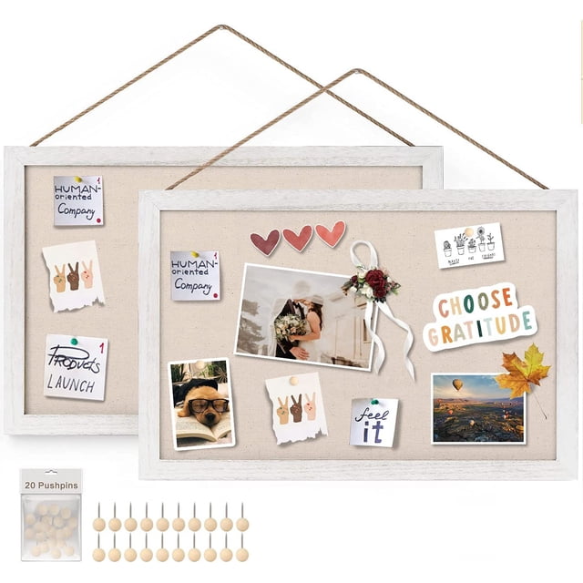 Sfugno Wood Bulletin Boards, 2-Pack linen wall bulletin board set, two rectangular white wooden-framed cork pin boards (16"x11" each) front-facing with light linen texture and slim engineered-wood backing, includes pushpins, staged on a neutral wall for home, kitchen or office use; suitable for photos, notes, weekly plans and small mementos.