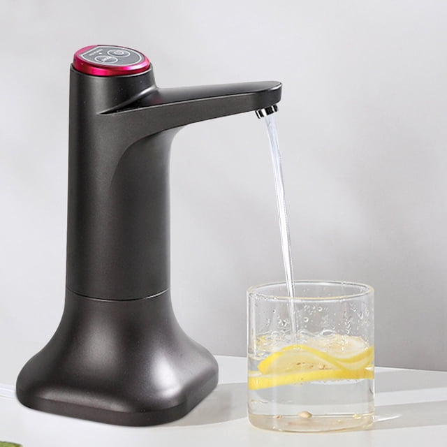 Sentmoon Electric Water Pump Household Bottled Water Intelligent Automatic Water Dispenser with base in grey color. The dispenser features a sleek design with a detachable base, wireless water suction pressure functionality, and a spout dispensing water into a glass with lemon slices. Suitable for tabletop or bucket use, it includes USB-V8 charging, operates quietly, and is ideal for hygienic and spill-free water dispensing.