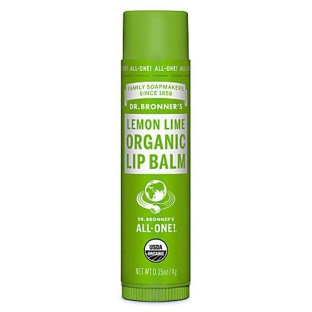 Dr. Bronner's Magic Soaps Organic Lip Balm, Lemon Lime, 0.15 Ounce front-facing stick lip balm tube labeled Dr. Bronner's with lemon-lime flavor text; compact travel-size moisturizing balm for lips, often used to soften cuticles or keep small skin areas hydrated while traveling.