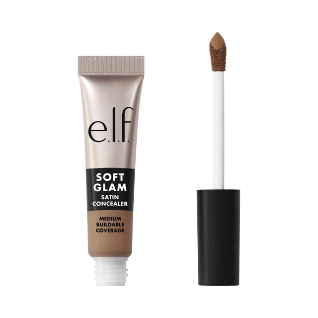 e.l.f. Cosmetics Soft Glam Satin Concealer, 31 Medium Neutral, 6.3 mL, with a closed beige and black tube and a separate applicator wand showing creamy concealer on a doe-foot tip, providing medium buildable coverage and a satin finish, often used for natural makeup and precise touch-ups.