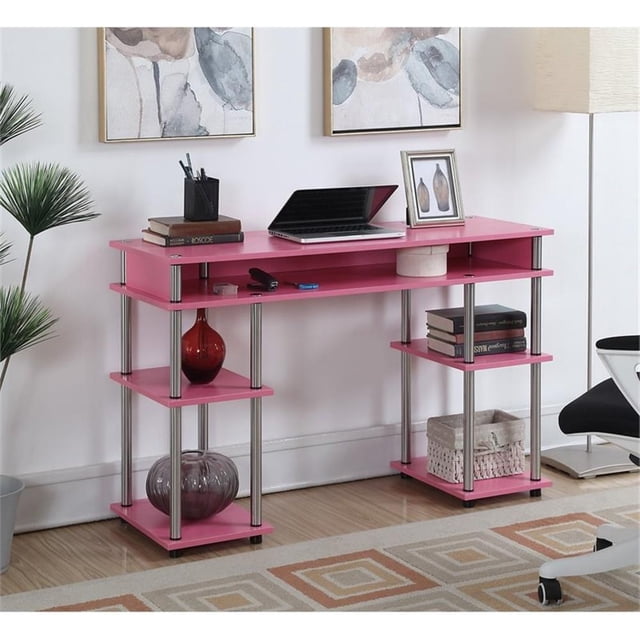 Convenience Concepts Designs2Go Bureau d'Étudiant Sans Outils en Fini Bois Rose, Présentant un design Moderne avec Plusieurs Étagères Ouvertes pour le Rangement. Fabriqué en Panneau de Particules durable à Fini Rose Vif, Supporté par des Poteaux en Acier Inoxydable avec Pieds Protecteurs à Embout de Caoutchouc. le Bureau Mesure 30 Pouces de Hauteur, 47,25 Pouces de Largeur et 15,75 Pouces de Profondeur, Ce Qui le Rend Idéal pour les Dortoirs, les Bureaux Ou les Espaces Compacts. Présenté dans un Décor de Bureau à Domicile avec des Articles Décoratifs et un Portable sur le Bureau