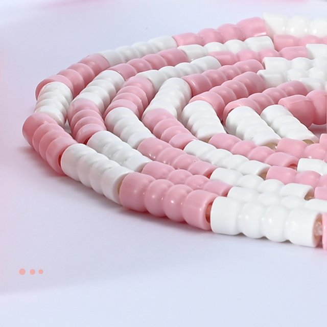 Rope Segmented Soft Beaded Skipping Rope Adjustable Length Fitness Rope for Kids and Adults. The image shows a close-up view of the multicolour soft beaded rope in pink and white segments. Made of ABS, PVC, and nylon, the rope is 3 meters long with a 16 cm handle. The segmented design prevents tangling and ensures smooth, high-speed rotation. Suitable for all ages with adjustable length for personalized use.