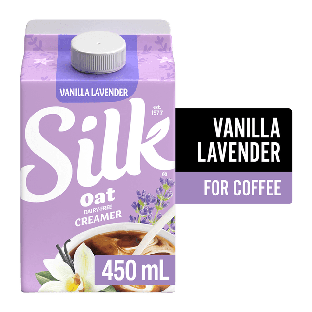 Silk Oat Coffee Creamer Vanilla Lavender, dairy-free plant-based creamer in a 450 ml carton with lavender and vanilla flower graphics, ideal for adding to coffee.