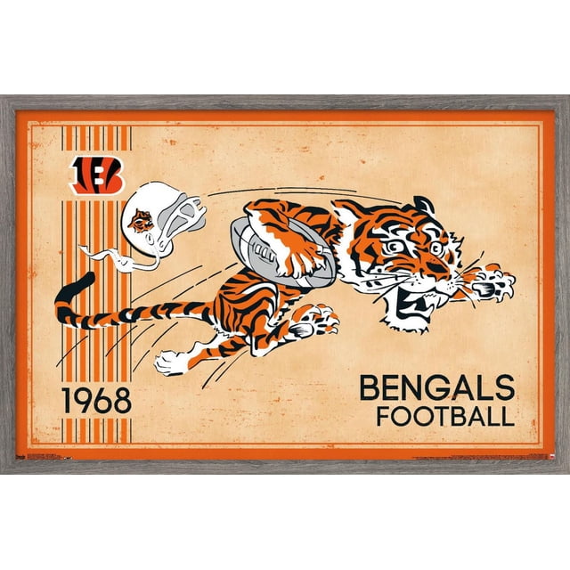 NFL Cincinnati Bengals - Retro Logo 14 Wall Poster, 22.375" x 34" featuring a vintage Bengal tiger illustration clutching a football mid-leap, with a white helmet showing the Bengals logo and the year 1968 on a beige textured background framed in orange, ideal for sports-themed wall décor in bedrooms, offices, or dorms.