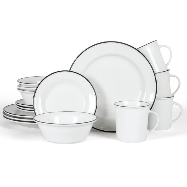 Martha Stewart Cliffield 16 Piece Dinnerware Set in white fine ceramic with bold black rims, including plates, bowls, and mugs arranged in a stacked display on a white background, dishwasher and microwave safe, suitable for everyday and special occasion dining.