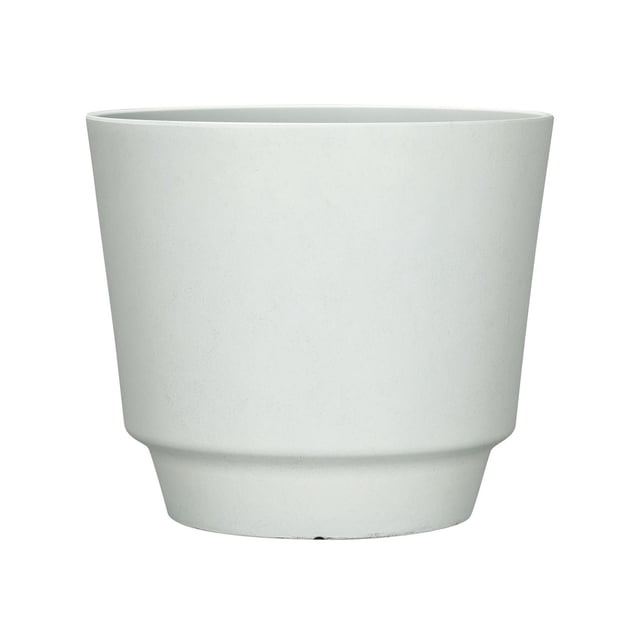 16 in. Calais Planter in a smooth, light neutral color with a tapered cylindrical shape and subtle base ridge. Made from recycled materials, it is lightweight, weather resistant, and features knock-out drainage holes for easy water drainage, ideal for indoor or outdoor garden spaces.