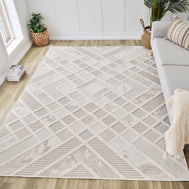 Rug Branch Maison Modern Indoor Area Rug in cream beige featuring a geometric abstract pattern, made of 100% polyester with jute backing, displayed on light wood flooring in a living room with a light grey sofa, striped cushions, woven plant baskets, and natural light, ideal for living room, bedroom, dining room, or kitchen use.