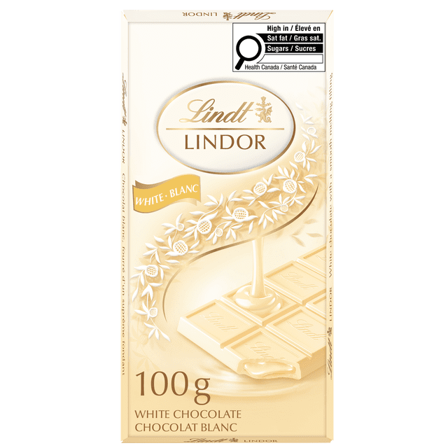 Lindt LINDOR Barre de Chocolat Blanc, 100 g, Chocolat Blanc Suisse avec 12 Carrés et Centres de Fusion Doux, Présentant un Tourbillon floral Décoratif et une Étiquette d'Avertissement Nutritionnel Santé Canada, Convient pour Offrir Ou pour un Plaisir Personnel.