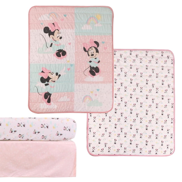 Disney Minnie Mouse 3 Piece Crib Set with a 34” x 34” comforter featuring large Minnie Mouse illustrations in pastel pink and mint blocks with rainbows and hearts, a 28” x 52” cotton fitted sheet printed with small Minnie Mouse figures on white, and a soft pink crib skirt with white polka dots, designed for baby bedding and nursery décor.