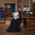 thumbnail image 4 of Ida B. Wells Barbie Inspiring Women Doll with Newspaper Accessory, 4 of 6
