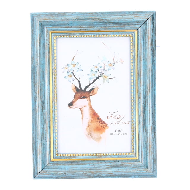 Photo Frame Gift by Dewin, a 4x6 photo frame made of wood-based composites with a decorative blue distressed finish and gold accents. The frame features a vertical orientation and includes a whimsical deer illustration with floral antlers. Suitable for desktop decoration or photo commemorative collection. Approximate size is 15 x 20 cm (5.9 x 7.9 inches).