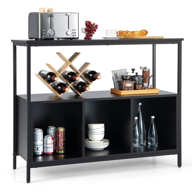 Costway Buffet Sideboard Kitchen Storage Cabinet in black with a spacious cabinet top, open shelf, and three compartments. The cabinet is shown holding a toaster, wine bottles, and kitchenware, demonstrating its versatile storage capacity. Made of engineered wood and steel, it features a modern design suitable for kitchens, dining rooms, or living rooms.