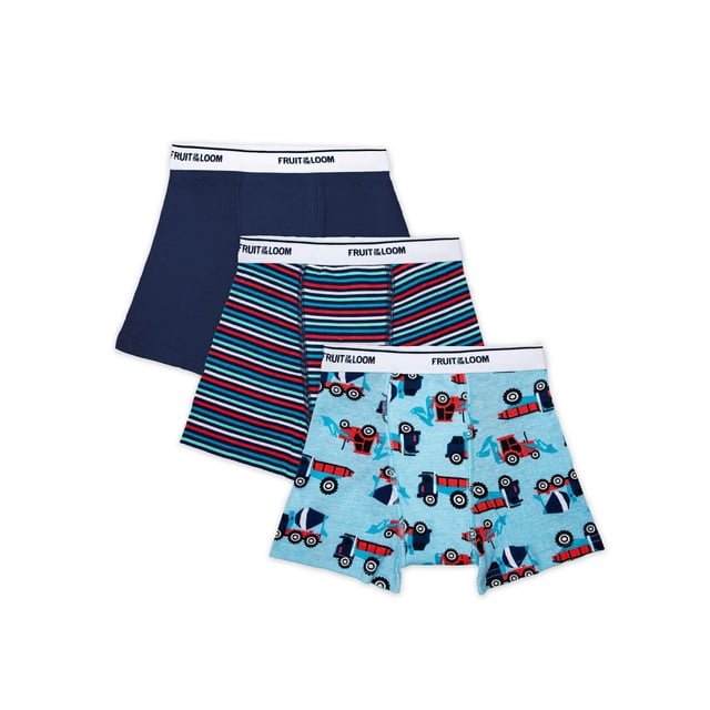 Toddler Boys' Training Boxer Briefs, Assorted 3 Pack with three pairs of toddler underwear featuring a white Fruit of the Loom branded waistband. Includes a solid navy pair, a navy and red striped pair, and a light blue pair printed with red and blue construction trucks. These training briefs fit toddlers 2T to 5T, provide multi-layer leak protection, and are machine washable for easy care.