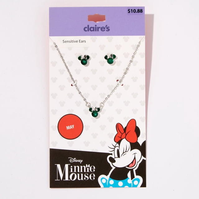 Claire's Collier de Pierres Précieuses Minnie Mouse sous Licence Disney et Ensemble de Bijoux avec Boucles d'Oreilles Assorties pour Taureau. l'Ensemble Présente le motif Emblématique Minnie Mouse avec des Pierres Précieuses Vertes, Symbolisant la Beauté et la Mise à la Terre, Idéal pour les Anniversaires de Mai. Emballé sur une Carte d'Exposition de Marque avec des Graphiques Minnie Mouse et des Détails du Zodiaque Taureau.
