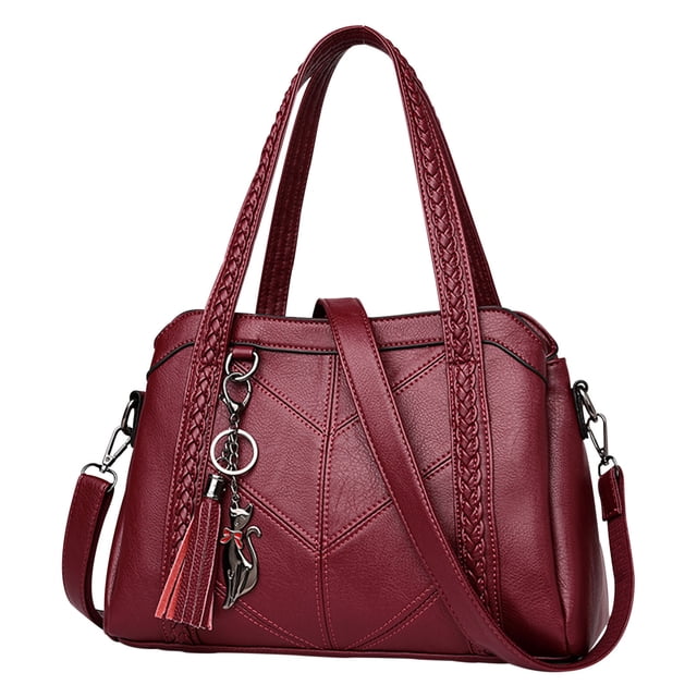 Tote Bag For Women Ladies Large Capacity Handbag Soft Leather Woman Messenger Bags Luxury Purses Crossbody Handbags. This red tote bag features high-quality leather with silver hardware and a polyester lining. It has braided handles, an adjustable shoulder strap, and a decorative charm with a tassel and cat design. The bag measures 11.8 inches long, 4.7 inches wide, and 7.8 inches high, with a handle height of 7.8 inches and an adjustable strap length of 23.6 to 47.2 inches. It includes three main compartments, internal slot pockets, a backwall zipper pocket, and an external back zipper pocket, suitable for carrying cosmetics, wallets, phones, and more. Ideal for work, travel, or casual outings.