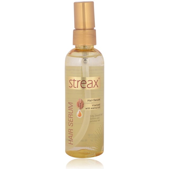 Streax Hair Serum - Walnut Oil 100ml Bottle with a transparent container and golden cap. Designed for hair care, it features walnut oil to provide silky smooth hair, softening and polishing strands effectively.