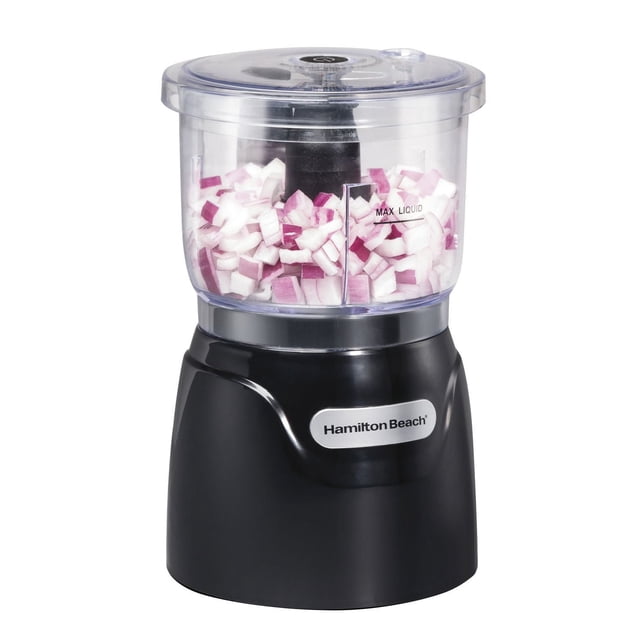 Hamilton Beach Stack & Press 3 Cup Food Chopper 72850G with a clear 3-cup bowl filled with chopped red onions, black base with Hamilton Beach logo, and transparent lid with press-activated control, suitable for quick chopping of herbs, nuts, and vegetables.