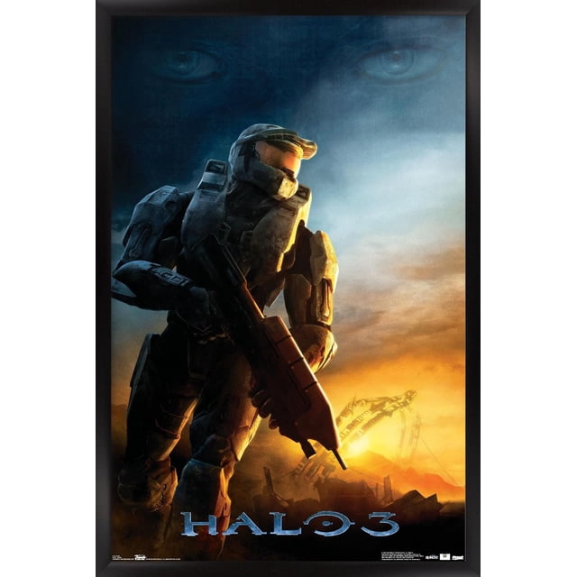 Halo 3 - Awakening Wall Poster depicting a front-facing armored soldier holding a rifle with a sunset sky and futuristic ring structure in the background, faint large eyes in the dark blue upper background, framed in black, suitable for gaming or entertainment room decor.