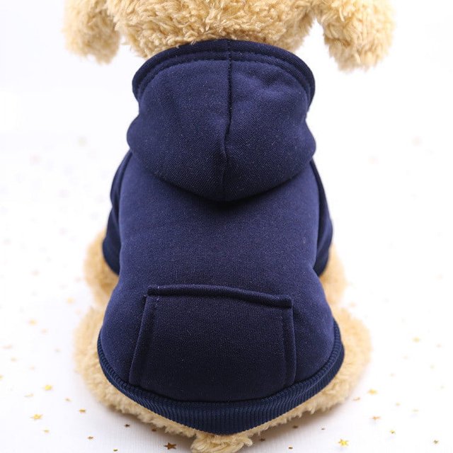 TopLLC Puppy Sweater Dog Clothes And Winter Pet Clothes in a navy blue color, displayed on a small dog mannequin. This polyester sweater features a hood and a back pocket, designed for warmth and comfort during winter walks or outings. Ideal for dogs and other small pets.