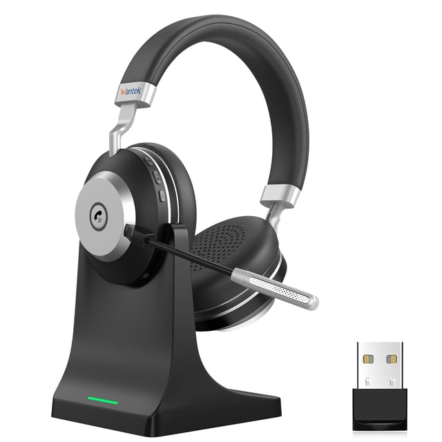 Wantek V5.3 Computer Bluetooth Headset with Microphone for PC, featuring noise-cancelling mic, USB dongle, charging base, and mute button. The headset is shown on its sleek black charging base with a visible USB dongle nearby. Designed for work, cell phones, computers, call centres, and Zoom, it supports Bluetooth 5.0 connectivity with a range of up to 33 ft and can connect to two devices simultaneously. The headset offers up to 50 hours of working time after a 2-hour charge.