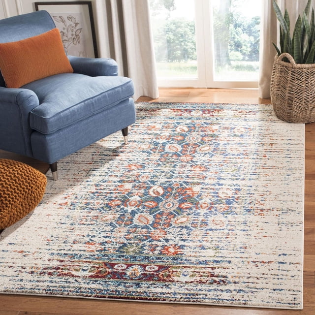 Safavieh Monaco Annabelle Tapis Vintage pour Aire avec un Motif floral Persan Bohème-Chic Usé en Tons Bleu, orange et Crème, Polypropylène Tissé Mécaniquement avec pile à Boucles Mixtes Haute et Basse, Exposé dans un Salon Éclairé au Soleil à Côté d'Un Fauteuil Bleu avec un Oreiller orange et un Cache-Pot Panier Tissé, Convient pour Ajouter un style vibrant aux Maisons de Campagne Ou de Ville.
