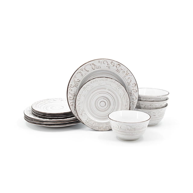 Pfaltzgraff Trellis 12pc Dinnerware Set featuring stacked dinner plates, salad plates, and bowls with a rustic white finish and brown scroll pattern, dishwasher and microwave safe, suitable for casual dining or special occasions.