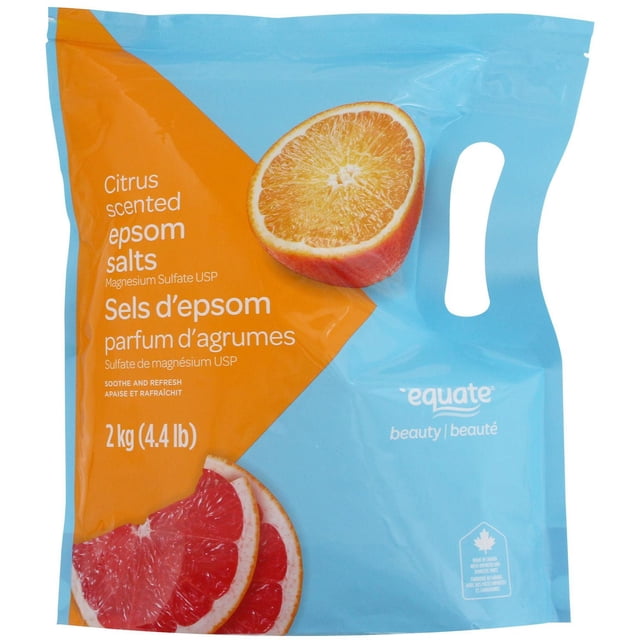 Equate Beauty Citrus Scented Epsom Salts in a 2 kg (4.4 lb) resealable blue and orange bag featuring sliced citrus fruit images, containing magnesium sulfate for bath use to soothe and refresh skin, ideal for relaxing bath soaks.