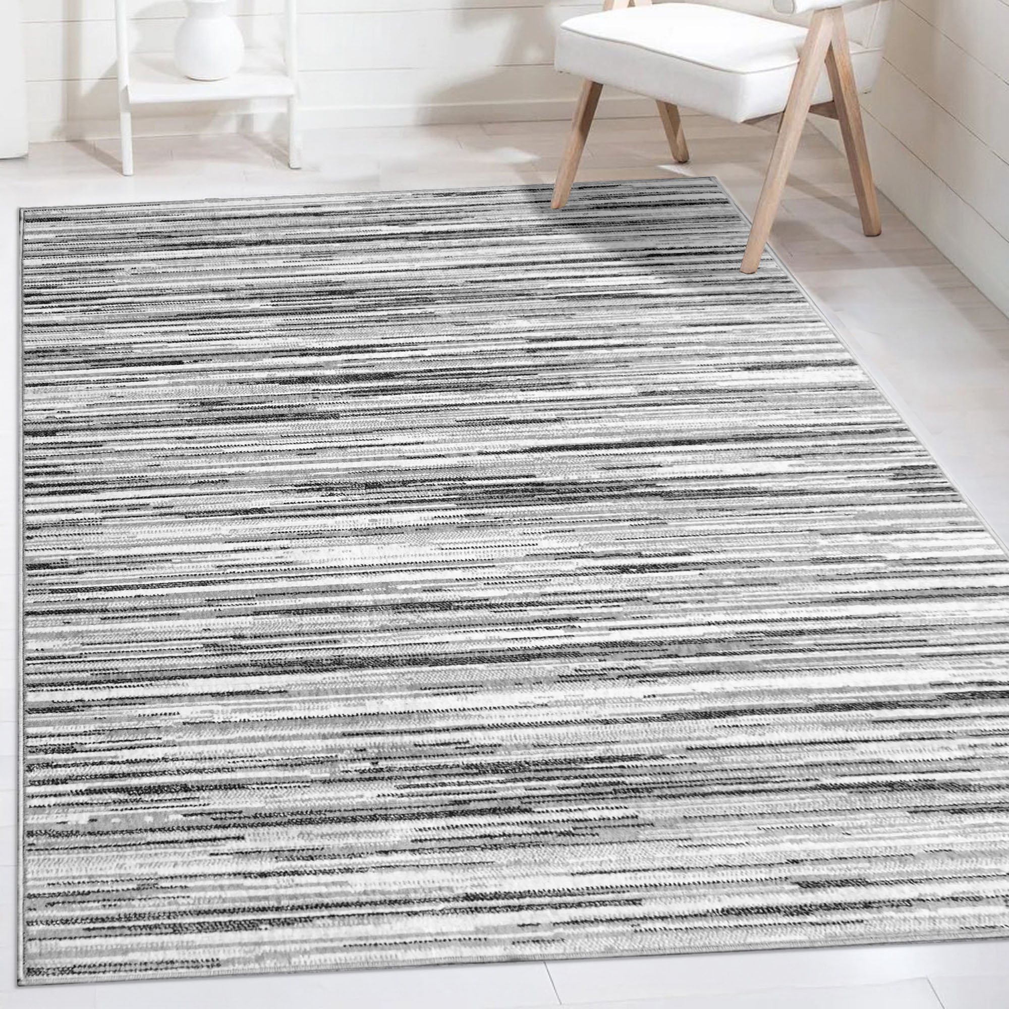 Mainstays Modern Abstract Low Pile Area Rug, White and Silver, 5 ft x 7 ft, for Bedroom, Living Room, Dining Area.