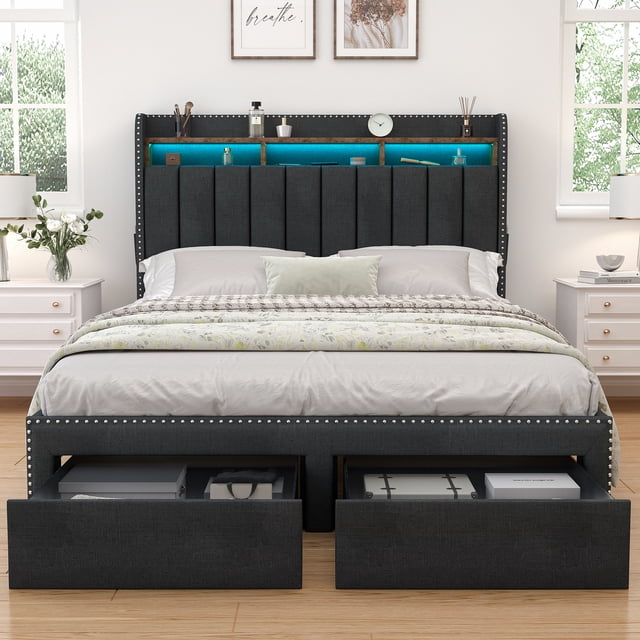 SIBEDS LED bed frame with drawer pockets and a dark gray linen-upholstered wingback headboard in a full size. The bed features customizable LED lighting integrated into the headboard, controlled via smartphone app or remote. The headboard includes open compartments and side pockets for additional storage. Two spacious under-bed drawers with see-through fabric tops provide extra storage. The frame is crafted with soft linen upholstery and high-resilience foam for comfort and back support. Designed for silent operation with sound-dampening strips and a secure slat system, it supports up to 1000 lbs and does not require a box spring. Shown in a bright bedroom setting with white furniture and decorative accents.