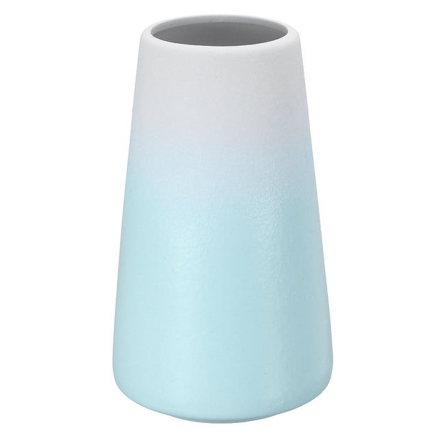 Unique Bargains Flower Vase, Ceramic Floral Vase for Fireplace Room Decor, Gradient Blue. This 6-inch tall ceramic vase features a gradient blue finish with a minimalist design, perfect for enhancing floral arrangements. Its sturdy construction ensures durability, making it suitable for home, table, bedroom, or living room decor. The vase measures 5 x 9 cm (2 x 3.5 inches) in diameter and is ideal for creating elegant centerpieces for dining tables, coffee tables, or special occasions.