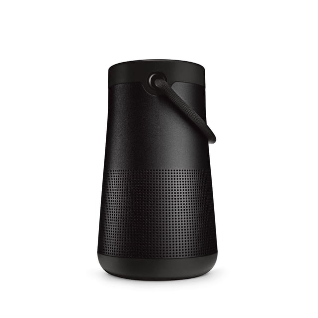 Bose SoundLink Revolve+ II Bluetooth® speaker in black with a cylindrical, slightly tapered shape. The lower half features a perforated metal grille for true 360° sound, and the upper half has a smooth matte finish with a flexible fabric handle near the top. This portable, water- and dust-resistant speaker offers up to 17 hours of rechargeable battery life and is suitable for indoor and outdoor use.