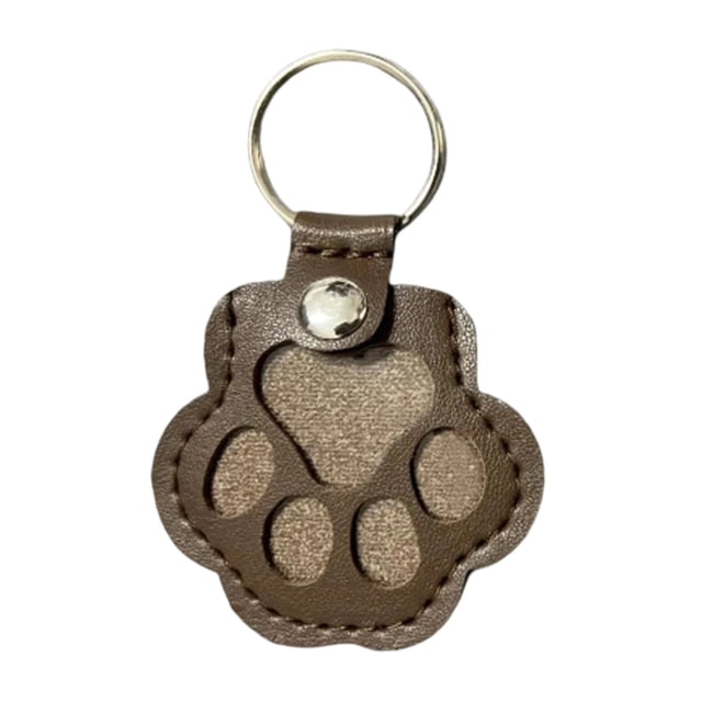 Wzzjkit Porte-clés de Rangement pour Chien en Forme de Patte, Fabriqué en Cuir Brun durable à texture Douce. le Porte-Clés Présente un Anneau en Métal pour une Fixation Sécurisée aux Clés Ou aux Sacs et Comprend un Compartiment pour Ranger les Poils d'Animaux comme Souvenir. Idéal comme Cadeau Commémoratif pour Animal Ou Accessoire Pratique pour les Amoureux des Chiens.