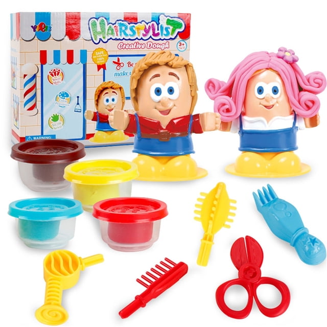 Big Save HWRETIE Puzzle Barber Color Mud Cut Hair DIY Plasticine Green Color Mud Toy. The set includes two colourful doll figures with interchangeable hairstyles, four containers of coloured dough in red, yellow, blue, and brown, and various hair styling tools such as scissors, combs, and rollers. The background features the product packaging with a hairstylist theme. Designed for children to create and style hair, promoting creativity and hand-eye coordination.