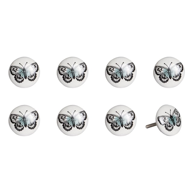 KNOB-IT VINTAGE HANDPAINTED CERAMIC KNOBS (8 Pack) K000001 showing eight white ceramic cabinet knobs with black and light blue butterfly designs arranged in two rows on a white background, one knob angled to reveal a metal bolt, ideal decorative hardware for cabinets and drawers with a vintage hand painted finish.