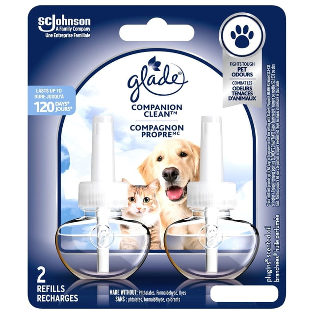 Glade PET Plugins® Air Freshener Oil Refill Companion Clean™ pack with two clear refill bottles featuring white caps, displayed on packaging with a cat and dog image, offering up to 120 days of pet odour fighting freshness and made without phthalates, formaldehyde, or dyes.