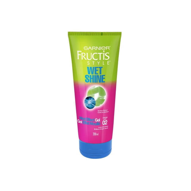 Garnier Fructis Style Wet Shine Gel 200 mL tube with green and pink gradient packaging and blue cap, a hair styling gel with bamboo extract providing strong hold level 02 and long-lasting shine for enhanced hair styling.