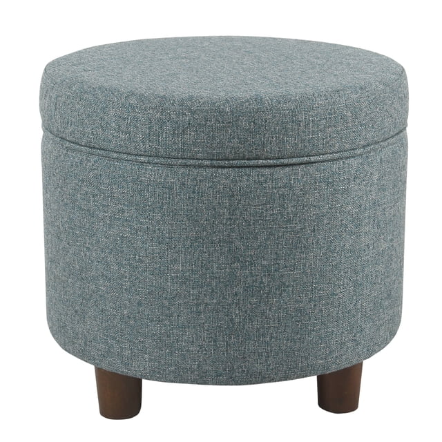 HomePop Round Tweed Storage Ottoman in teal tweed fabric, featuring a round design with a removable lid for storage. The ottoman is supported by tapered wooden legs and measures 19 inches high by 18 inches in diameter. Suitable for living rooms or bedrooms, it offers a weight capacity of up to 250 lbs and is easy to spot clean.