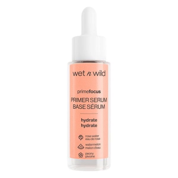WetNWild Prime Focus Serum primer serum hydrator in a clear glass bottle with white dropper cap and peach label featuring hydration benefits with rose water, watermelon, and peony extracts, suitable for facial skin care priming and hydration.