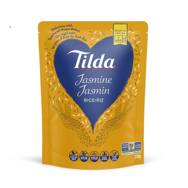 Tilda Ready-to-heat Steamed Jasmine Rice 250G in a yellow pouch with a blue heart featuring the Tilda logo and product name, highlighting gluten-free, vegan, and non-GMO attributes. This fragrant sticky rice is suitable for Southeast Asian dishes and pantry food, ready in 2 minutes.