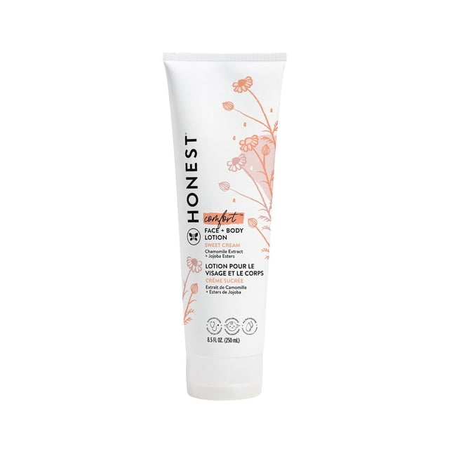 Honest Face & Body Lotion Sweet Cream in a white 250 ml tube with orange floral chamomile illustrations, featuring chamomile extract and jojoba esters. This fast-absorbing, hypoallergenic lotion gently moisturizes baby’s face and body.