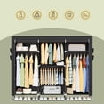 thumbnail image 4 of LEDREM Portable Closet, Fabric Wardrobe with 4 Hanging Rods, Clothes Rack with Shelves & Side Pockets, Large Capacity, Space-Saving, Black, 4 of 5