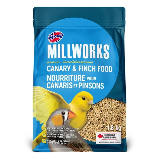 Millworks® Canary and Finch food in a 1.8 kg blue resealable bag featuring a yellow canary and zebra finch, containing a premium blend of wholesome whole grains, dried fruits, vegetables, and enriched with vitamins and minerals, made in Canada for indoor birds.
