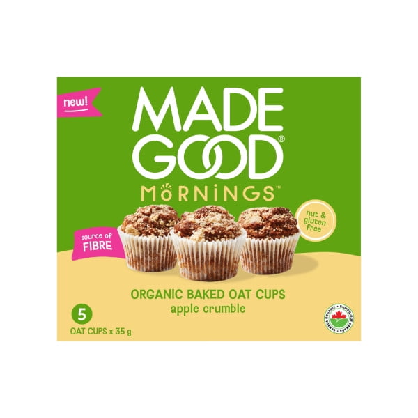 MadeGood Baked Oat Cups – Apple Crumble 5 Pack with three organic oat cups topped with apple crumble, displayed on a green and beige box highlighting gluten and nut free, source of fibre, and Canadian organic certification, suitable for a wholesome on-the-go snack.