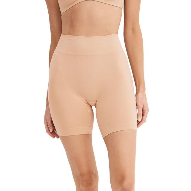 Ultralight Smoothing Slipshort 1-Pack in nude beige worn from waist to mid-thigh, featuring a high waistband and Seamfree® stretchy microfiber fabric for smooth, breathable, no-chafe coverage under dresses and skirts, suitable for active days.
