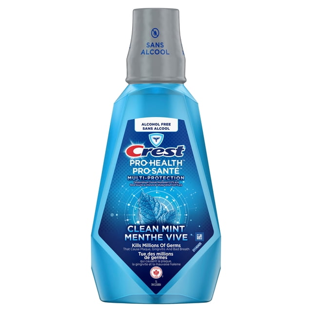 Crest Pro-Health Multi-Protection Alcohol Free Mouthwash with CPC in Clean Mint flavor, presented in a blue plastic bottle with a gray cap labeled 'Sans Alcool', designed to kill millions of germs causing plaque, gingivitis, and bad breath while freshening breath and supporting oral health.